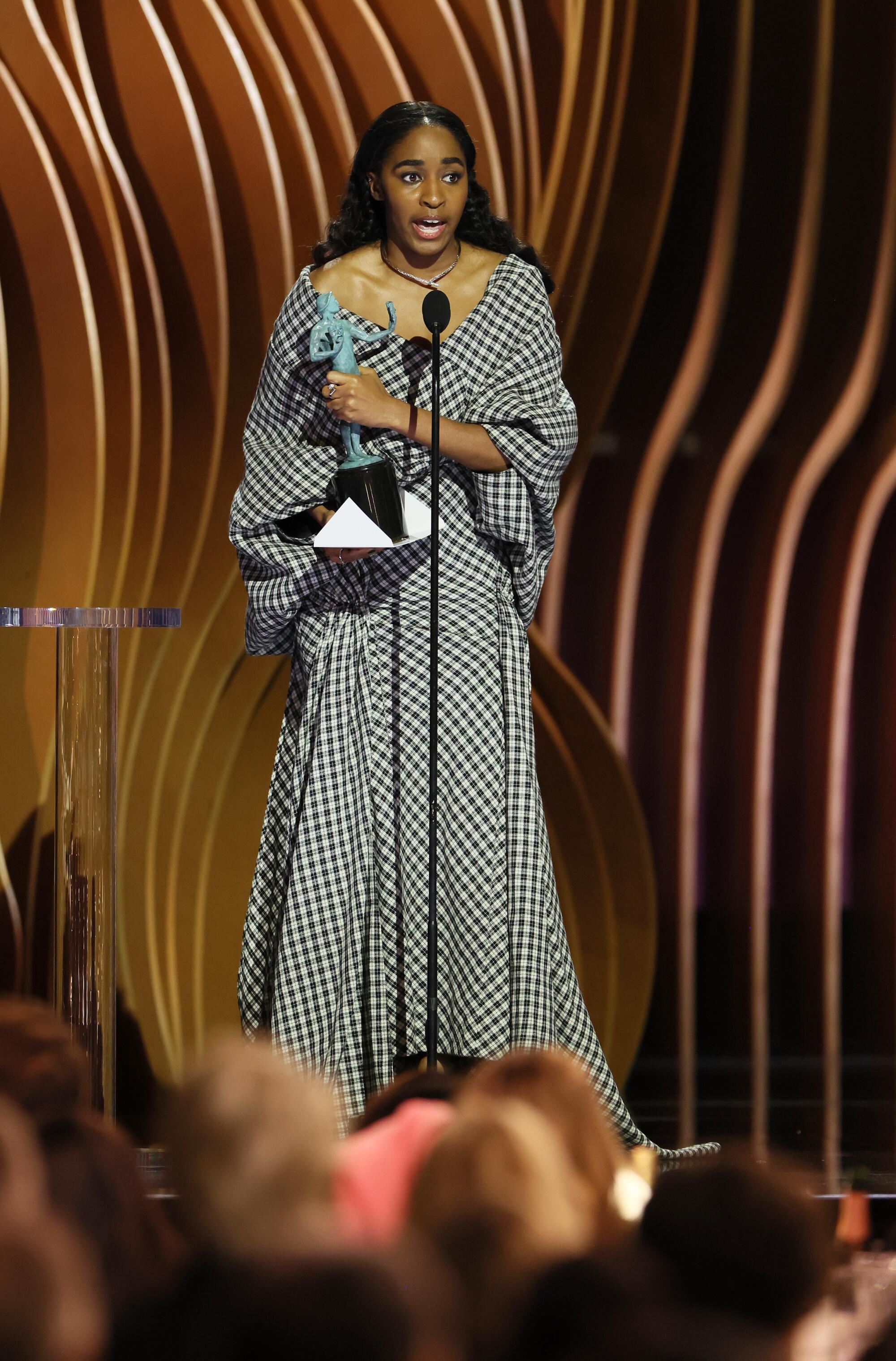 Ayo Edebiri wins for female actor in a comedy series.