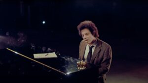 Billy Joel Sings "Turn the Lights Back On" in Video Created with Deepfake Technology