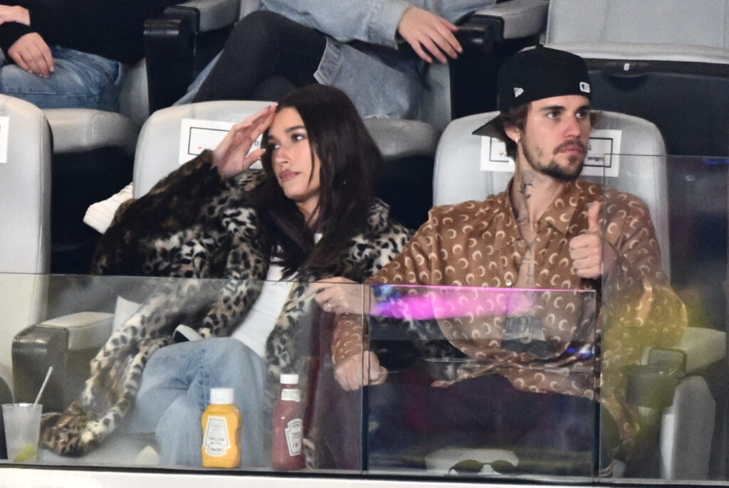 Justin Bieber- here with wife Hailey Bieber - was not at the halftime show featuring Usher