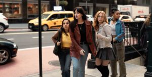 Anya Corazon (Isabela Merced), Cassandra Webb (Dakota Johnson), Julia Cornwall (Sydney Sweeney) and Mattie Franklin (Celeste O’Connor)&nbsp;all stand together on the sidewalk at the top of the stairs down to a New York City subway station (rude, y’all, blocking people from getting in or out) and look collectively panicked in Madame Web