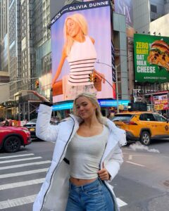 Olivia Dunne has taken a break from college to visit her Times Square billboard