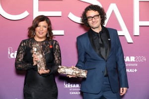 Director Kaouther Ben Hania and producer Nadim Cheikhrouha pose in the winners room with the 'Best Documentary' Cesar Award for the movie 'Les filles d'Olfa' during the 49th Cesar Film Awards at L'Olympia on February 23, 2024 in Paris, France.