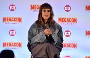 Alyssa Milano addresses the dispute Friday at MegaCon Orlando, a four-day fan expo in Florida.