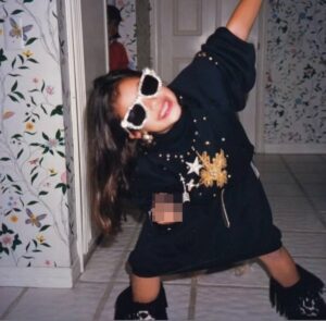 Kim Kardashian shared a childhood photo where she appeared to be sticking up her middle finger to the camera