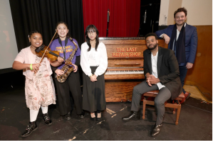 Young musicians featured in 'The Last Repair Shop' (L-R) Porché Brinker, Ismerai Calcaneo, and Amanda Nova, pose with co-directors Kris Bowers and Ben Proudfoot. 