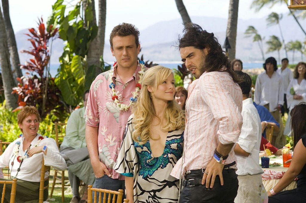 Jason Segel looks on as Kristen Bell stares at Russell Brand in Forgetting Sarah Marshall