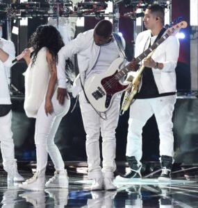 Usher slaps Nicki Minaj's butt onstage during the 2014 MTV Video Music Awards at The Forum on Aug. 24, 2014, in Inglewood, California.