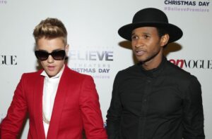 Usher and Bieber, seen here at the "Justin Bieber's Believe" premiere in 2013, are still friends.