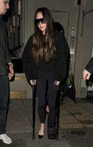 Victoria Beckham was seen using crutches last night