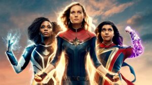 Monica Rambeau, Carol Danvers, and Kamala Khan all glowing with powers in a poster for The Marvels