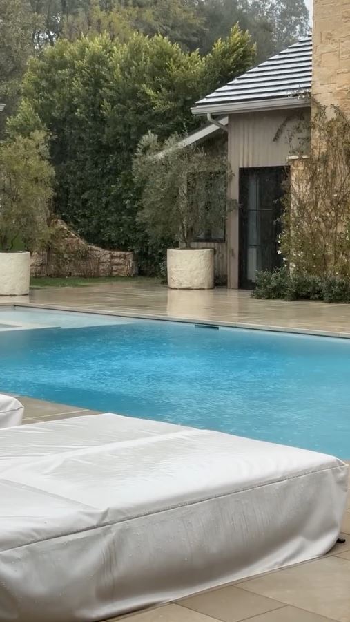 The Kardashians star showed off her pool on a rainy day