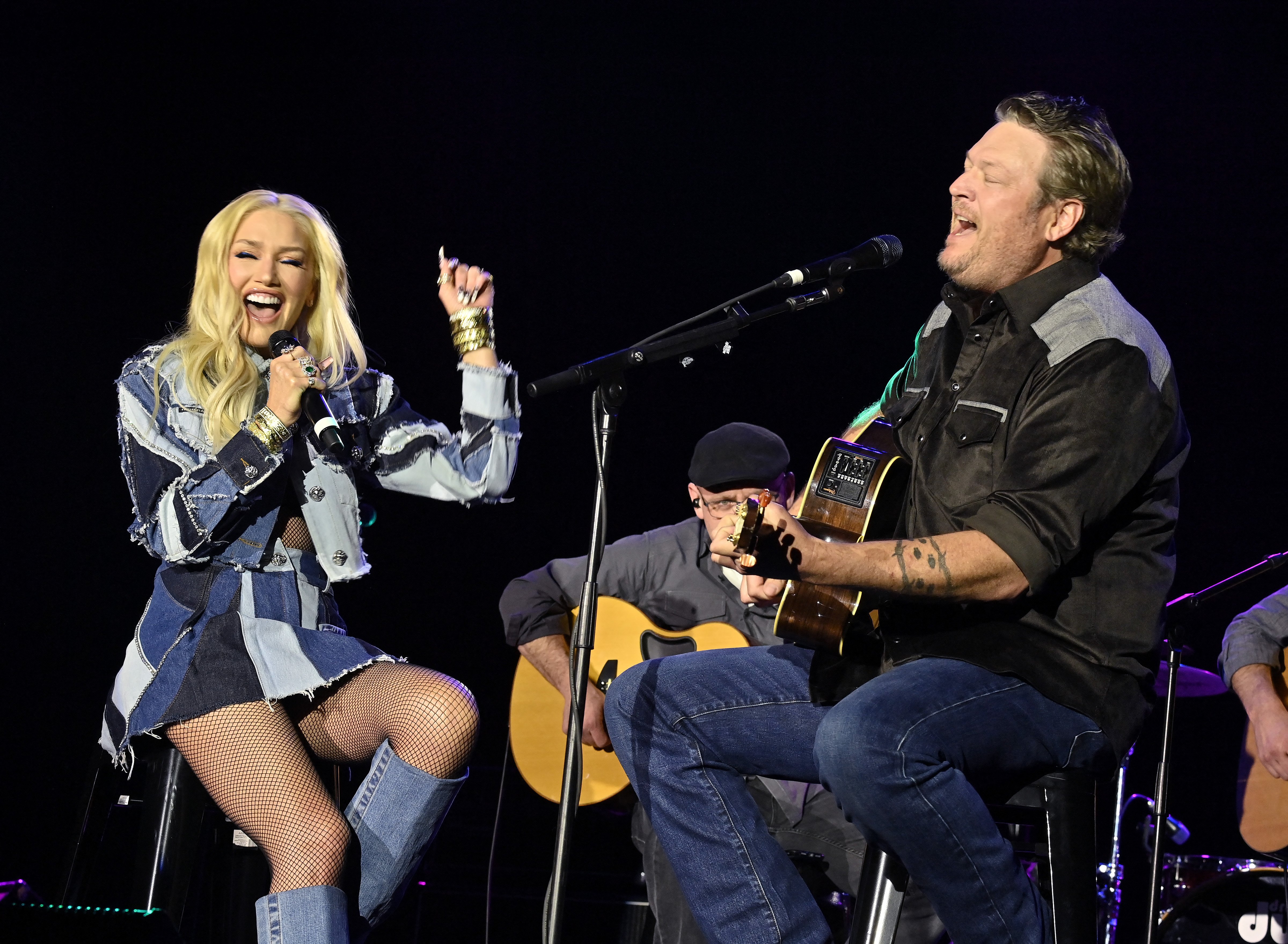 Gwen pictured performing with Blake Shelton at a concert in February 2024