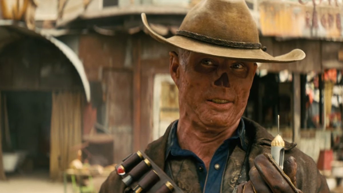 Waton Goggins red-scarred no-nosed cowboy hat wearing Ghoul from Fallout