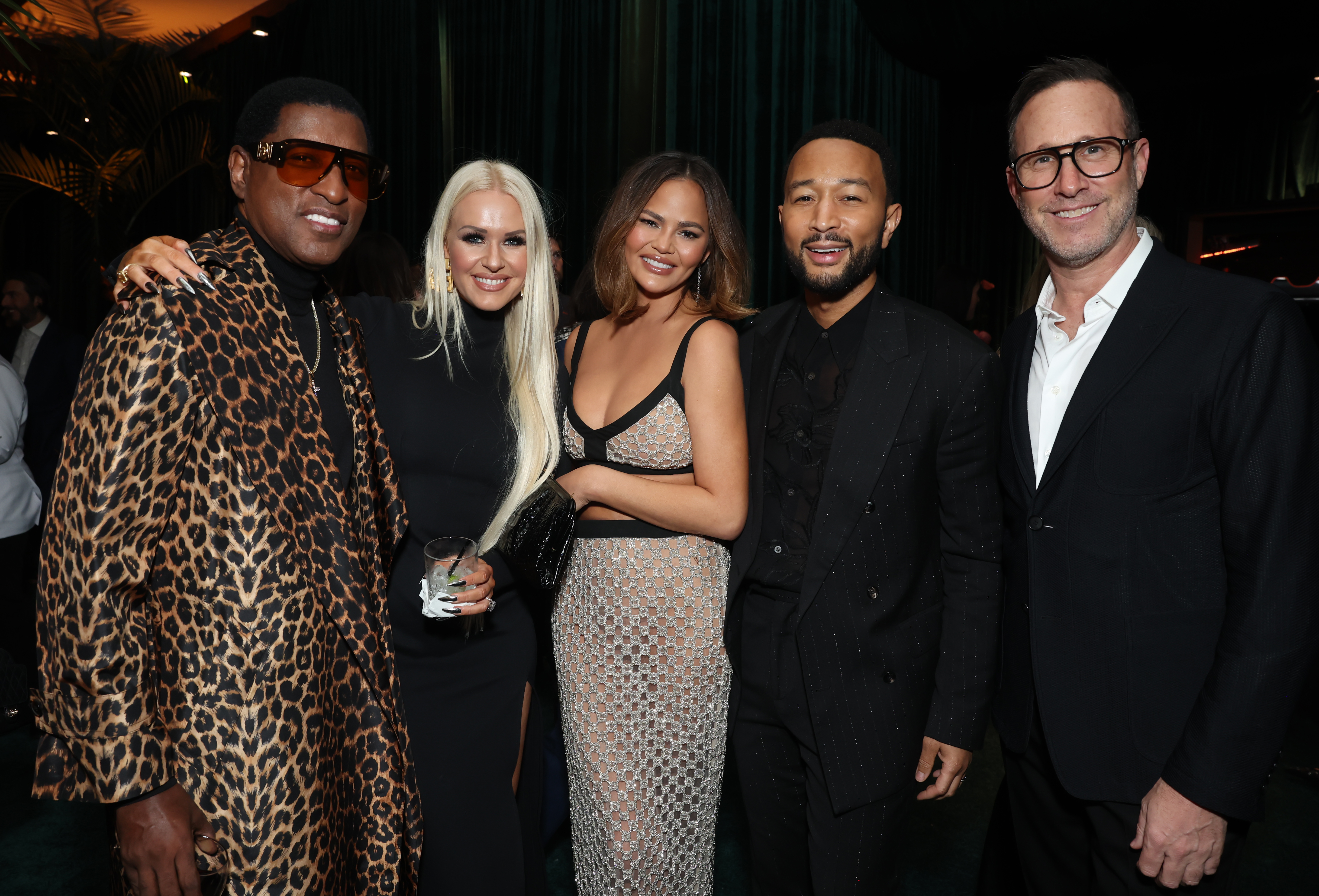 Chrissy and John Legend pictured with Babyface at the WME 2024 Oscar Party