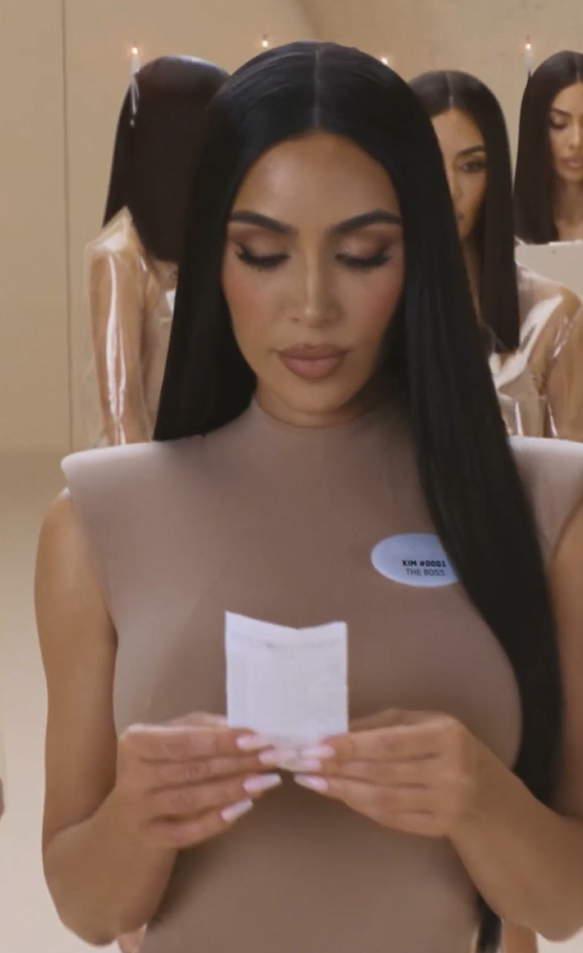 In her commercial, several versions of Kim were seen wearing skintight Skims shapewear