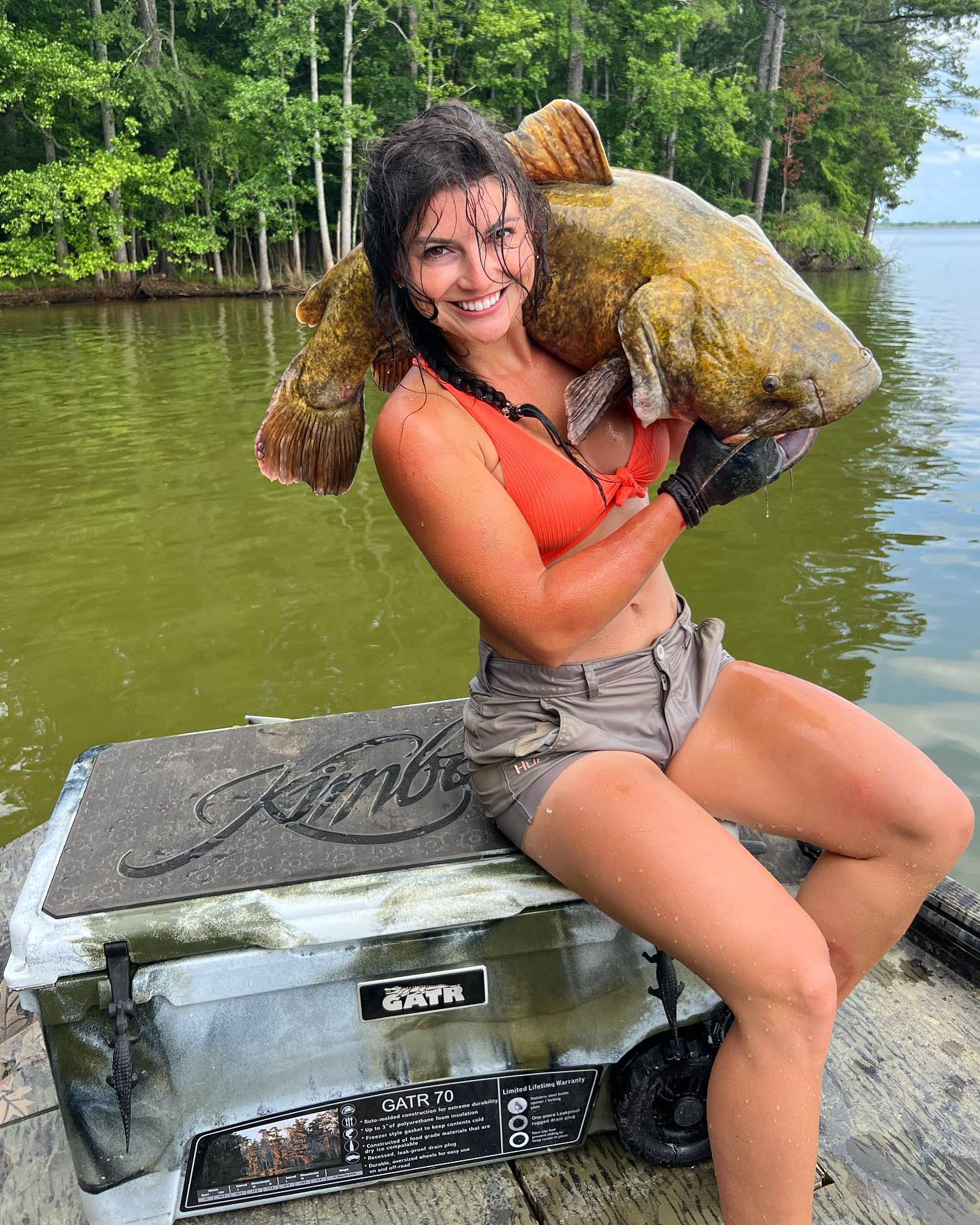 Barron posts glamorous pictures of herself holding monstrous catfish
