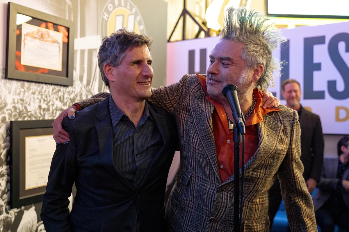 Posen and Fat Mike Burkett of NOFX at Hopeless Records' 30th Anniversary party