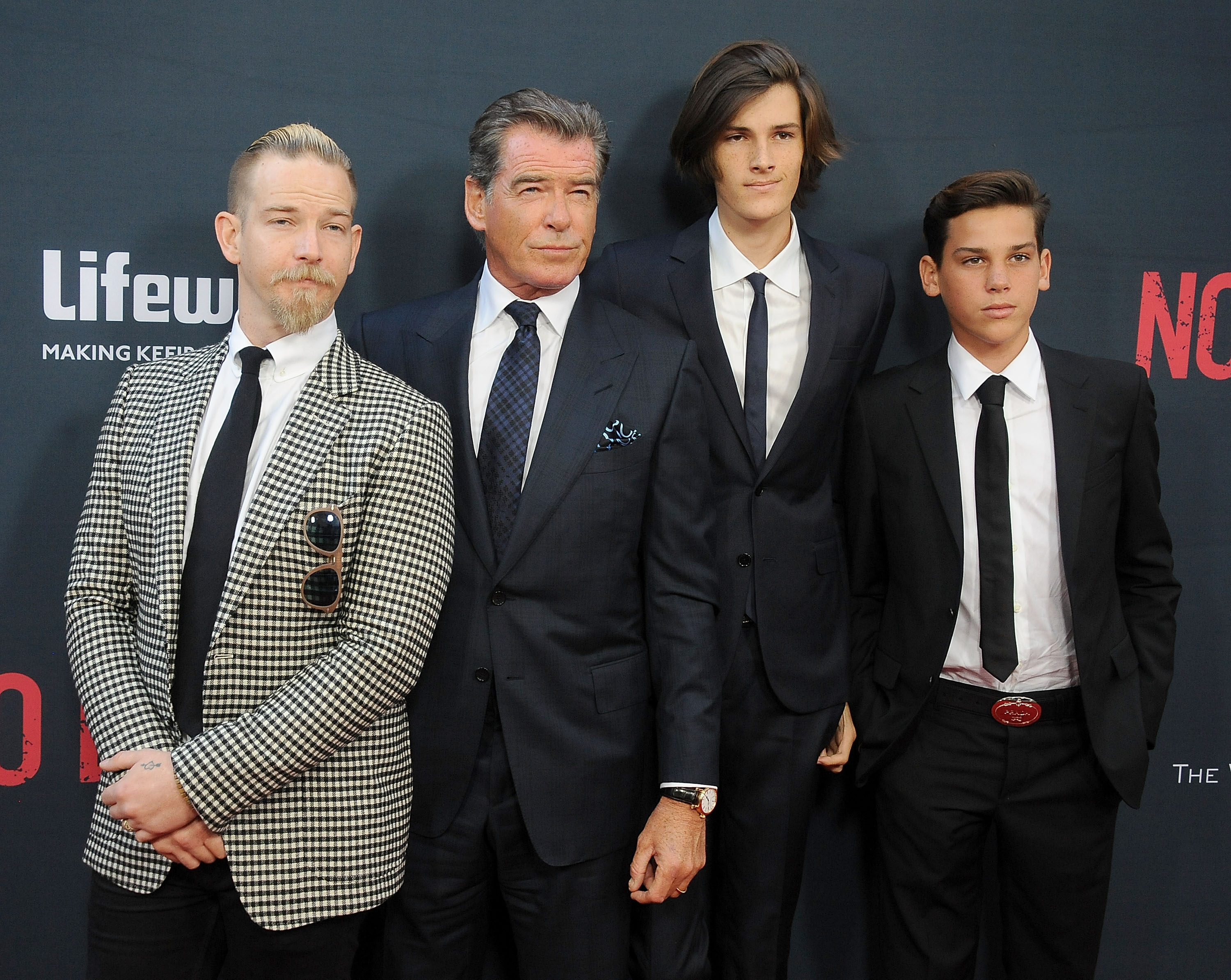 Pierce Brosnan pictured with his sons Sean, Dylan, and Paris