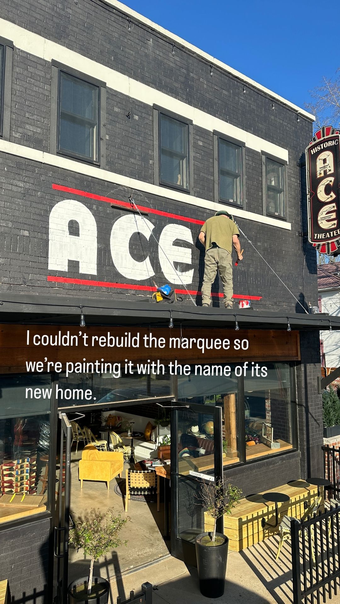 Leticia showed off the paint job for Ace Coffee Cafe's sign