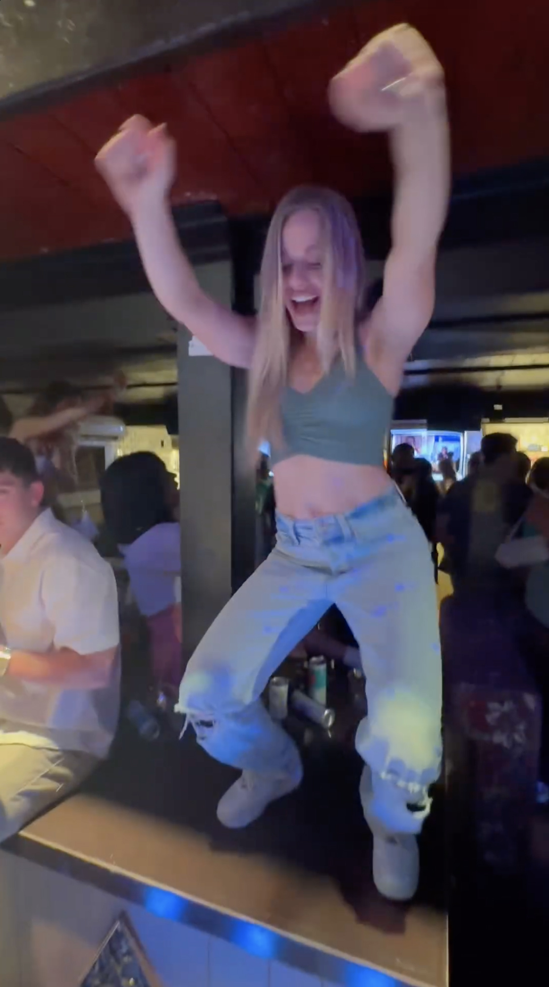 In the short video, Mackenzie was captured dancing on top of a bar to the rhythm of thumping club music