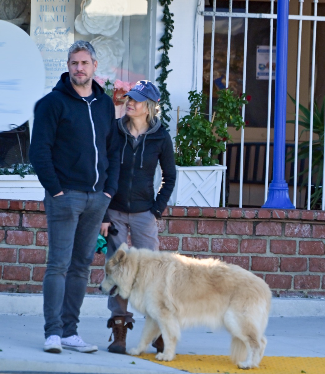 Ant Anstead and Renée Zellweger walk their dog in 2024