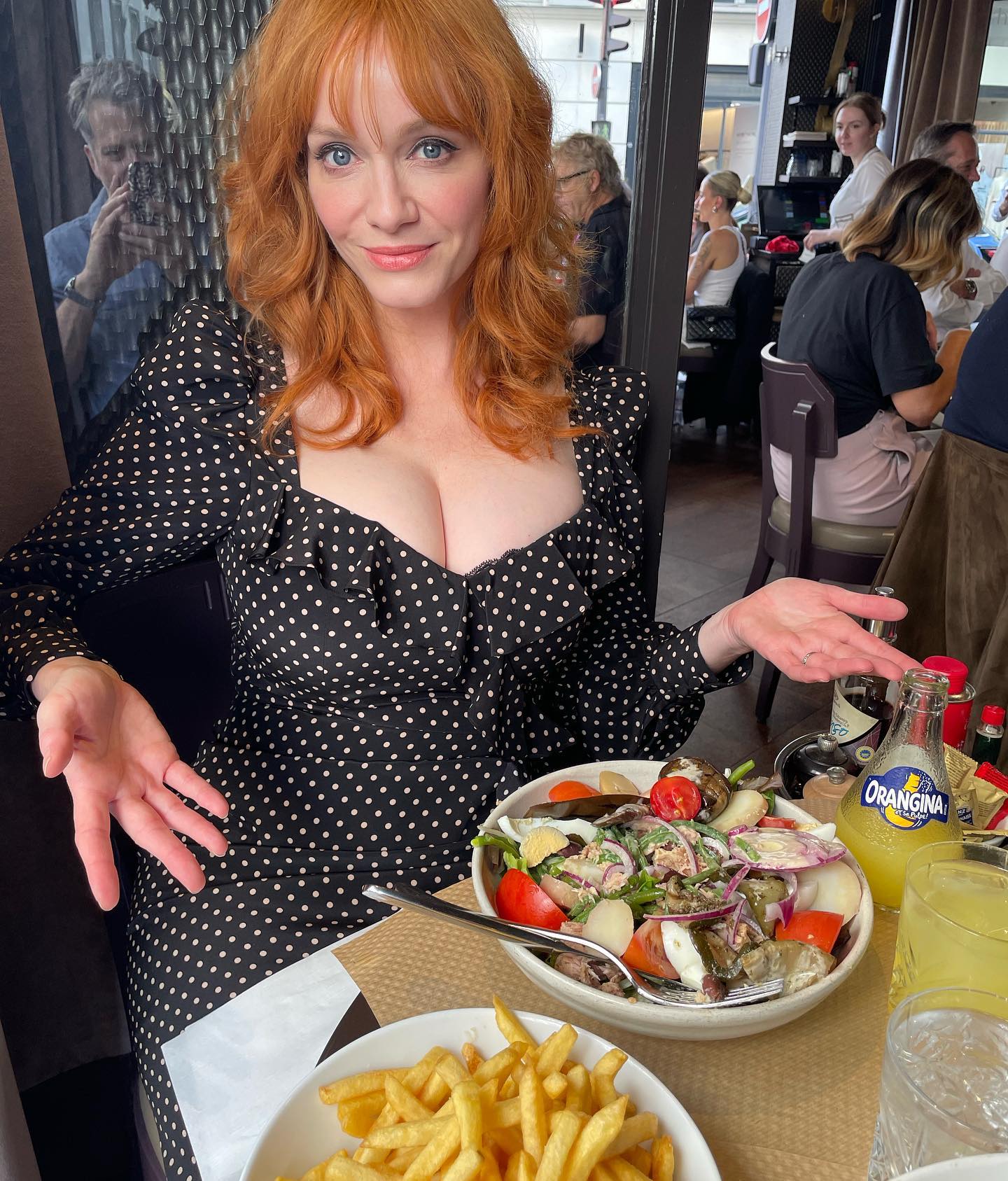 Christina risked a wardrobe malfunction as she took to her Instagram to share a glimpse of her meal while in Paris, France