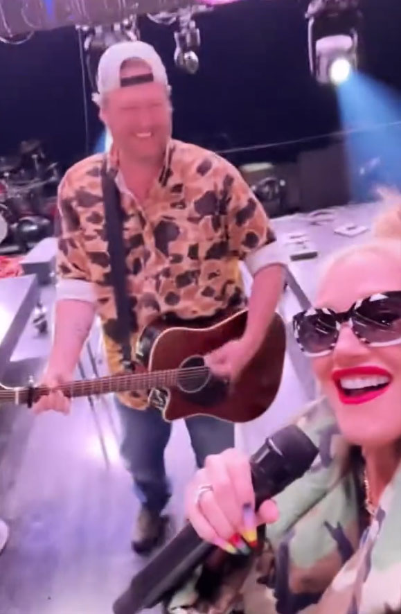 Gwen Stefani appears on stage with husband Blake Shelton during his