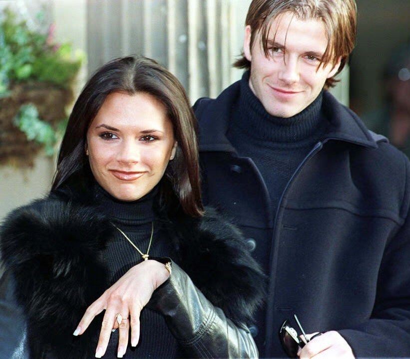 Victoria shows off her sparkler with David in 1998
