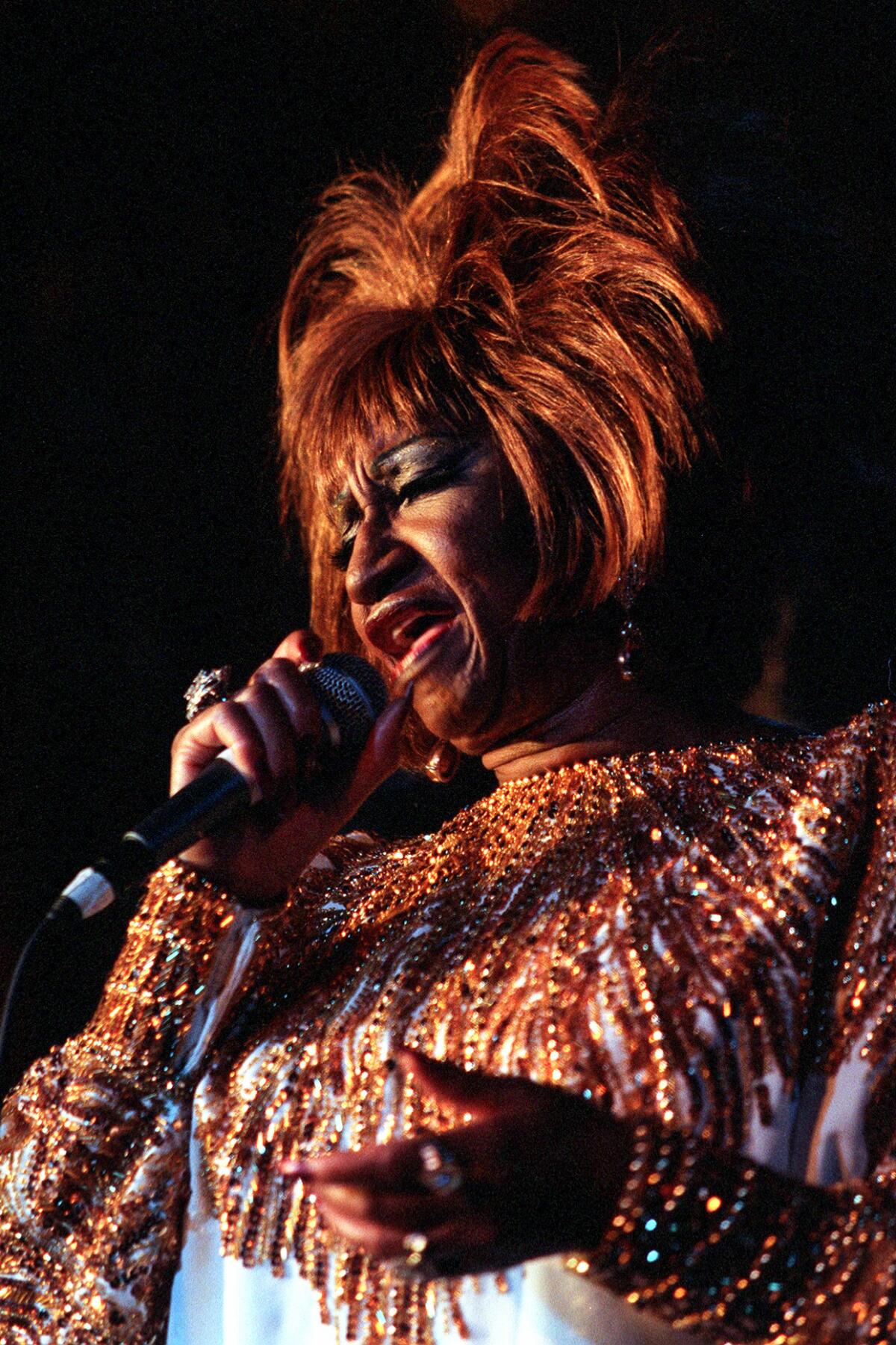 Legendary singer Celia Cruz performs at the Conga Room in 1998.