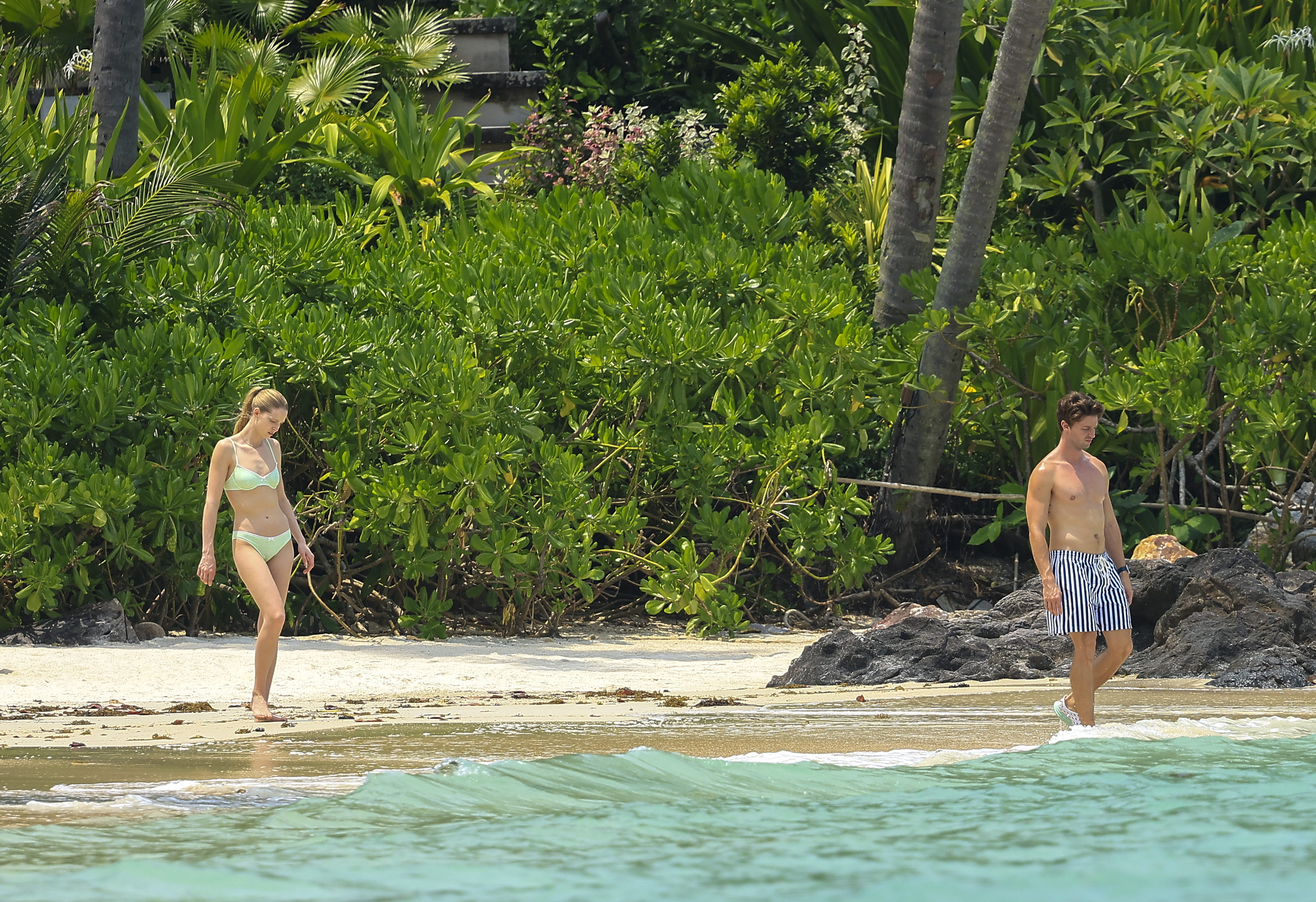Patrick went shirtless, showing off his fit physique while he and his model girlfriend enjoyed the tropical paradise