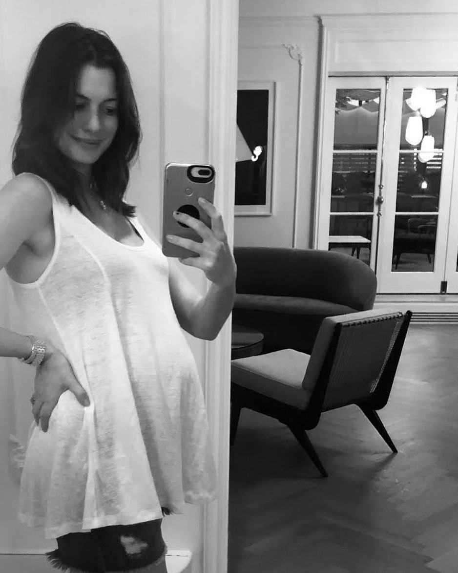 Anne showing off her baby bump in 2019