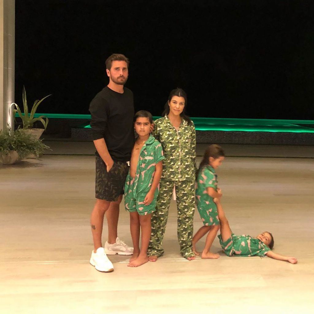 Kourtney Kardashian and Scott pictured with their three kids back in 2020