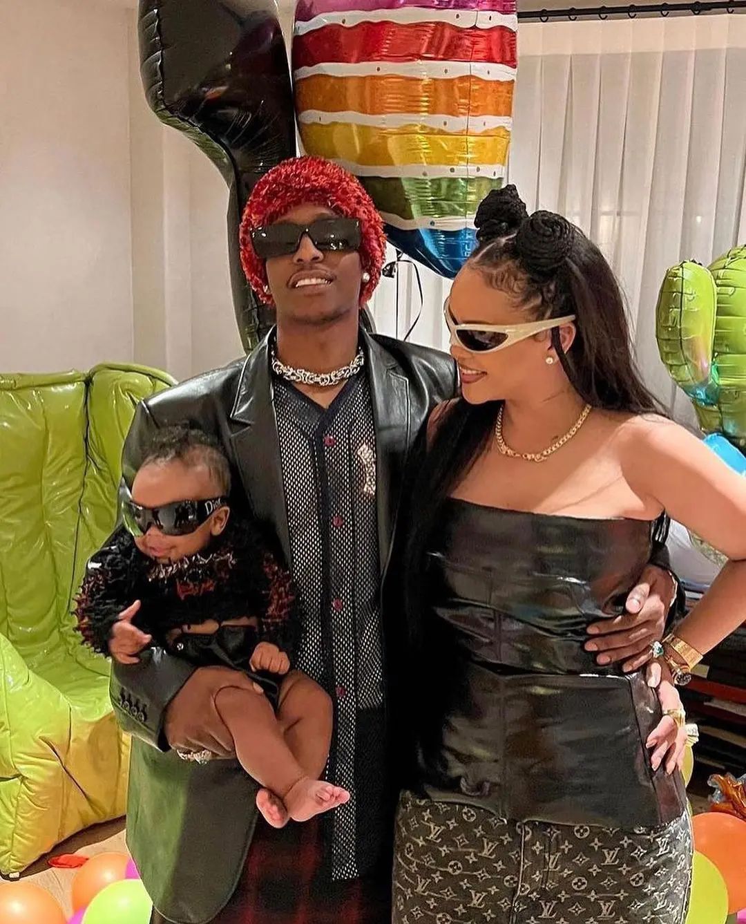 Rihanna and A$AP Rocky pictured with their oldest child, RZA
