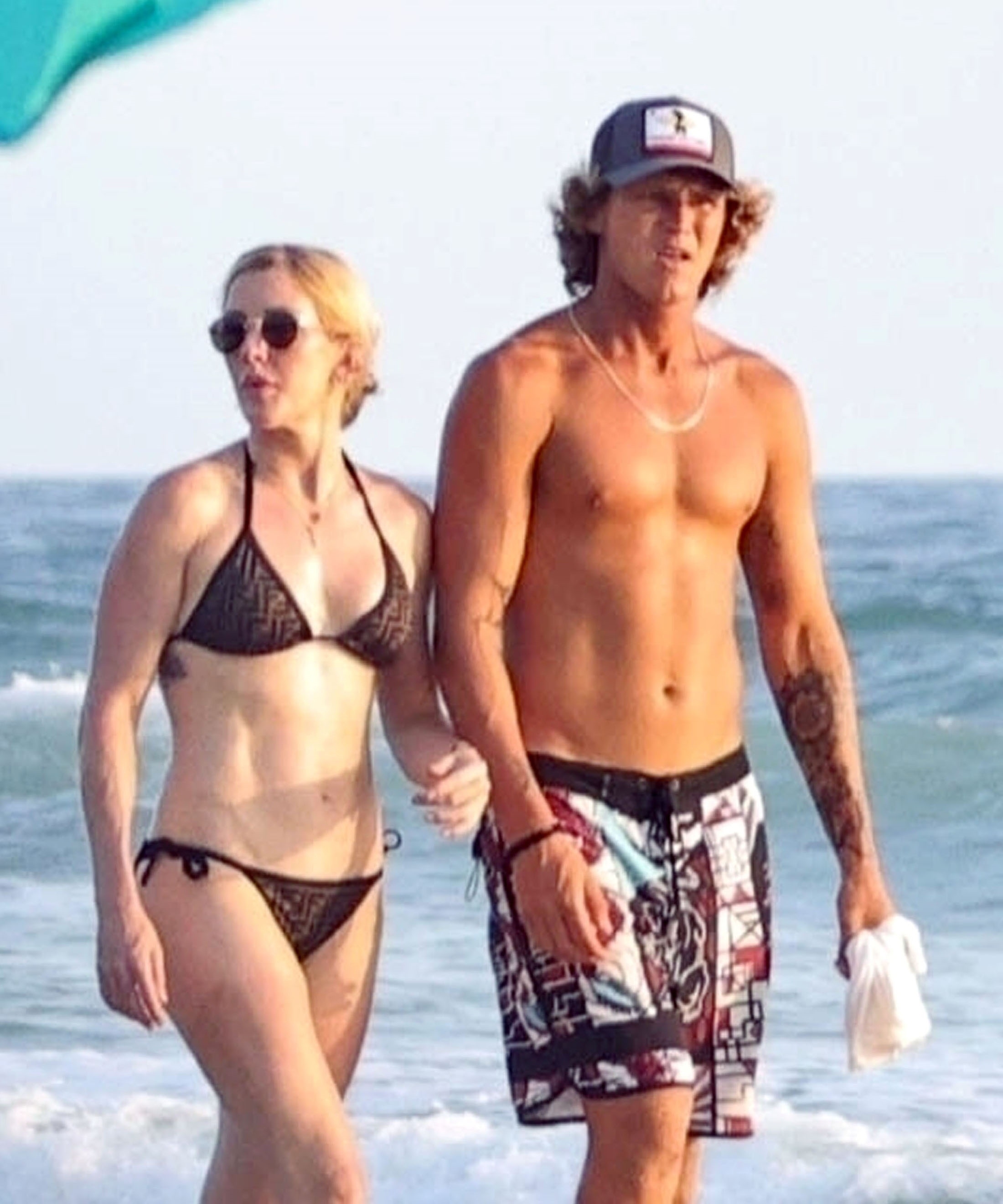 Ellie later switched to a black bikini and sunglasses
