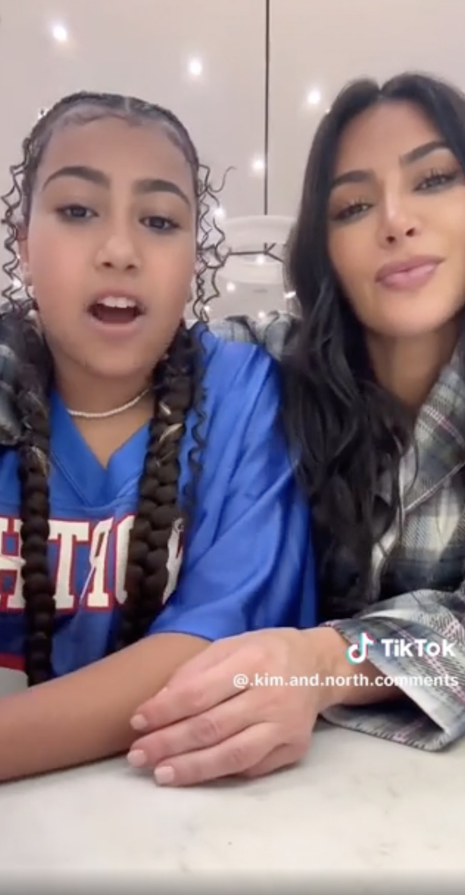 The video showed North wearing a blue jersey with her makeup done and curly hair styled in two long braids