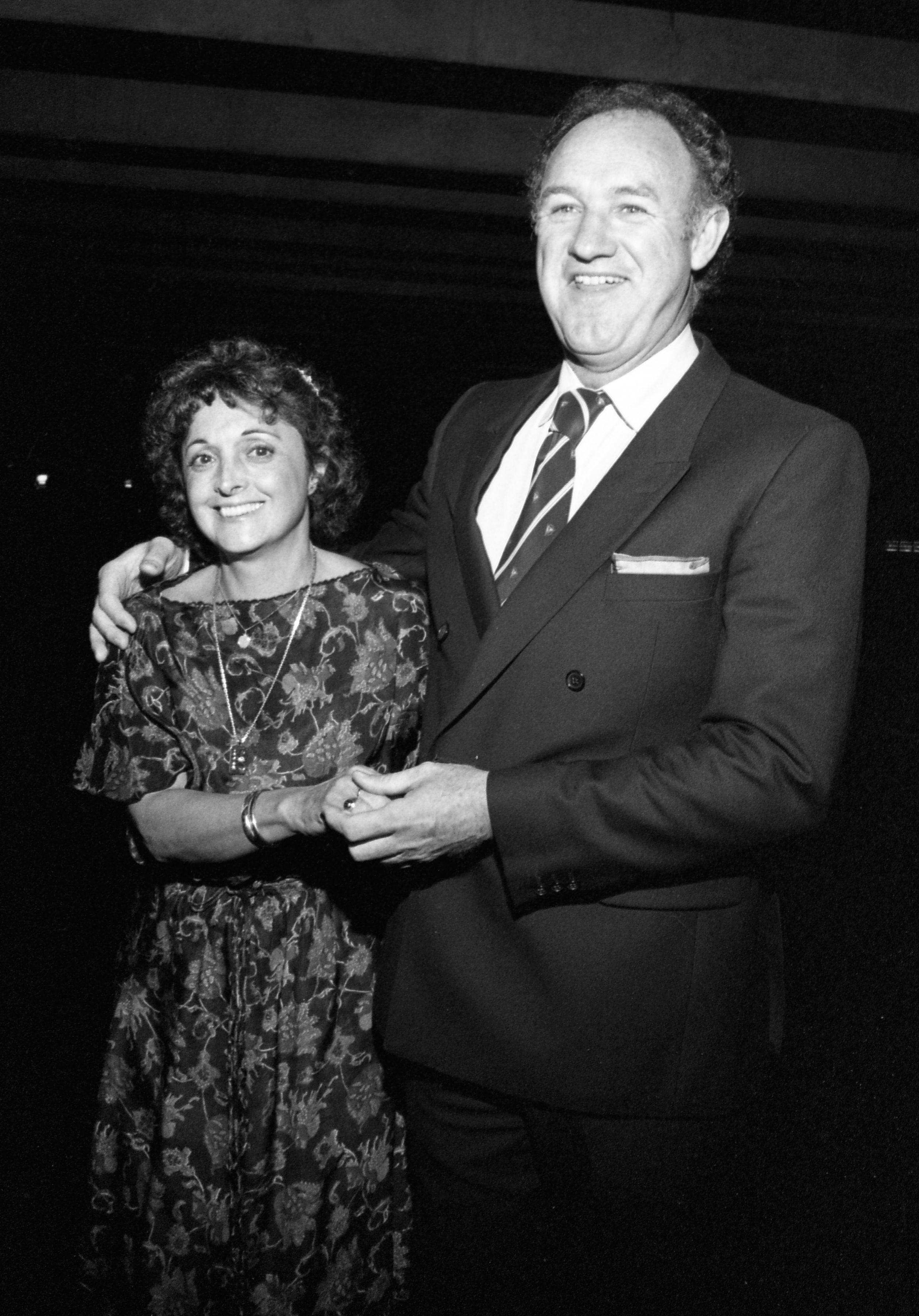 Gene Hackman and his first wife, Faye Maltese, are all smiles as they pose for a photograph in the 1980s