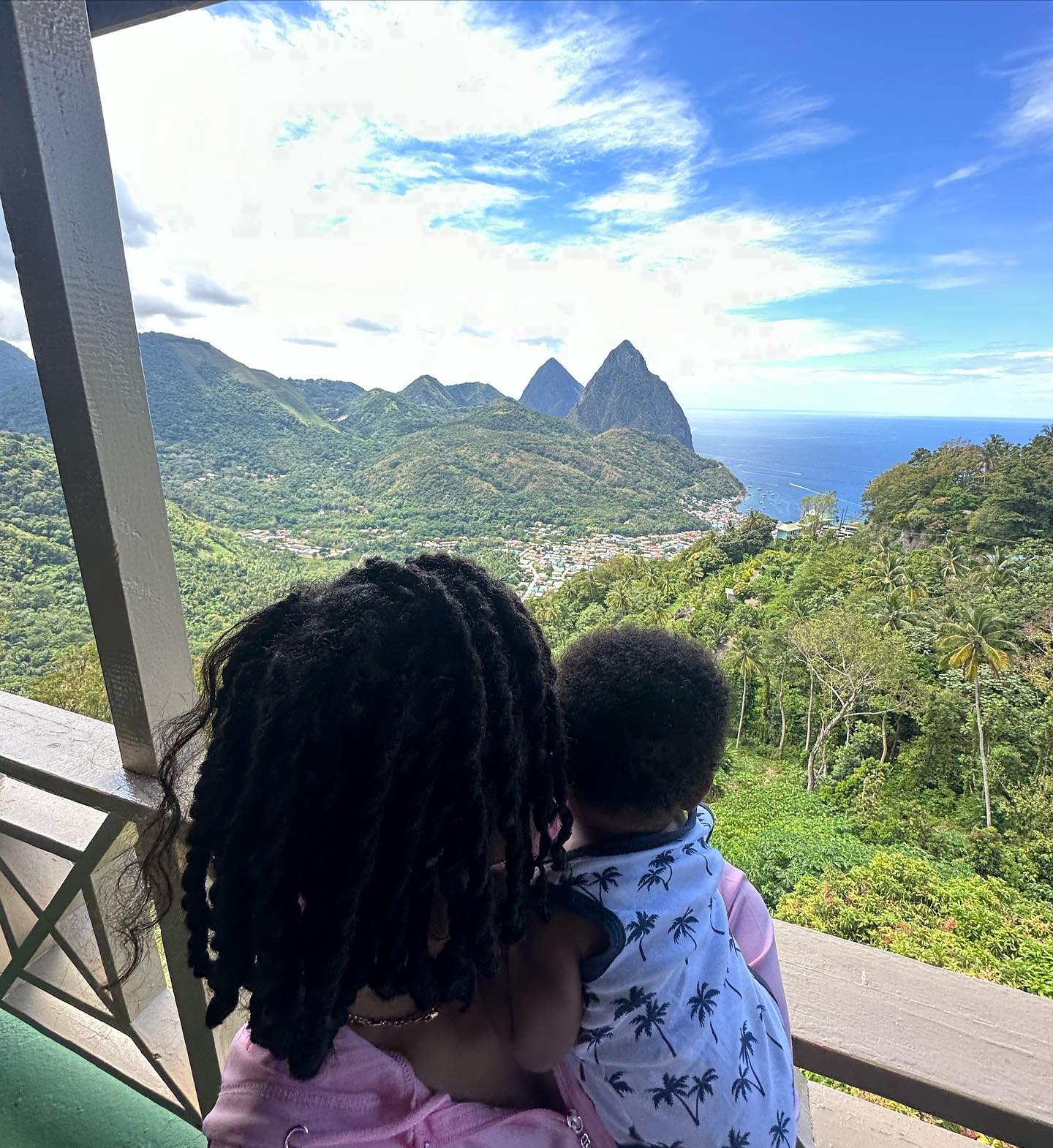 Halle held baby Halo while overlooking St. Lucia