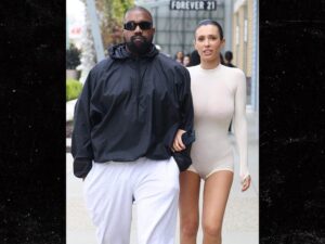 Bianca Censori in Revealing Outfit with Kanye West at Cheesecake Factory