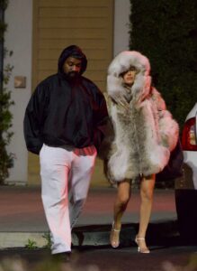 Bianca Censori looked serious while going pantless under a massive fur coat after leaving a Los Angeles movie theater with husband, Kanye West