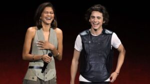 zendaya and timothee chalamet laughing on stage