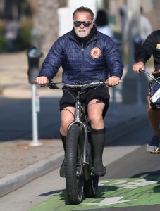 Arnold Schwarzenegger biking to Golds Gym in Santa Monica