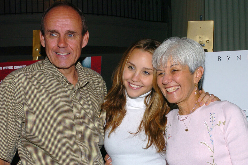 Amanda Bynes with her parents at an event