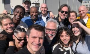 Isabela Merced poses with the cast of ‘Superman: Legacy’ including David Corenswet
