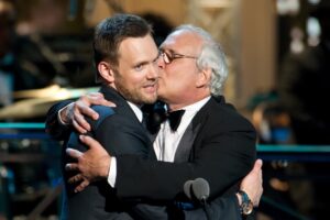 Joel McHale Says He Dislocated Chevy Chase's Shoulder — Best Life