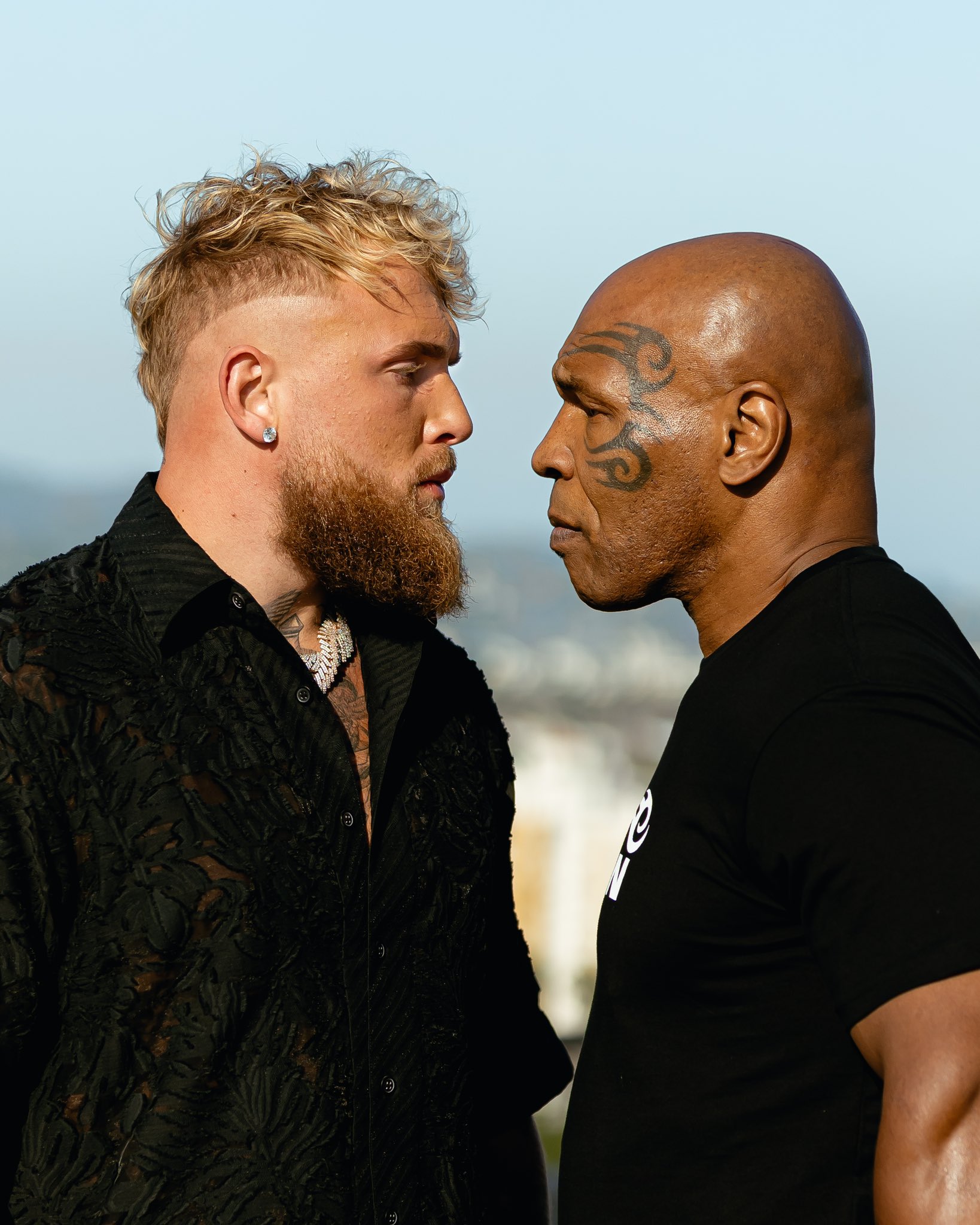 Jake Paul facing off with Mike Tyson