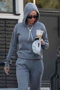Photos captured Katy Perry covering her rumored baby bump in a baggy sweat outfit