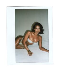 Lori Harvey showed a ton of cleavage while modeling a bikini from her swimwear line for a new post