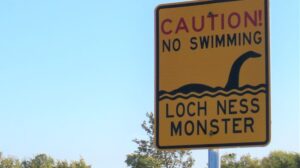 loch ness monster sign no swimming