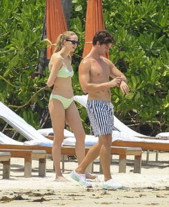 Patrick Schwarzenegger has hit the beach with his bikini-clad fiancée Abby Champion while filming in Thailand for White Lotus