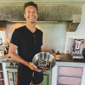 Ryan Seacrest (pictured) fans think that the host looked 'too skinny' and is the same weight he was in throwback picture